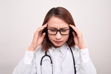 medical doctor woman with stethoscope problem, hold hand head on white background