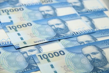 Obraz na płótnie Canvas Chilean peso bills - background