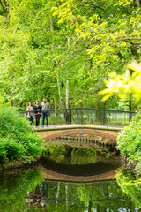 Tourists pose while on a bridge at Great Zoo Park in Berlin