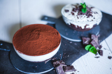Delicious homemade chocolate cheesecake with cocoa and mint