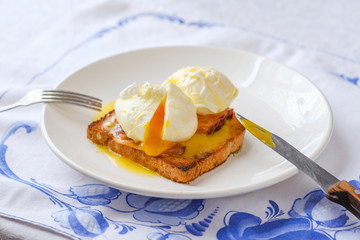 Eggs Benedict with bacon. Classic breakfast.