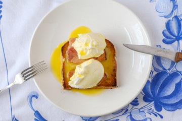 Eggs Benedict with bacon. Classic breakfast.