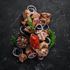Barbecue. Skewers with onions. Top view. Free space for your text.