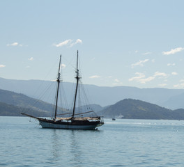 Fototapeta na wymiar Boats sailing in the sea. Beautiful blue sea.