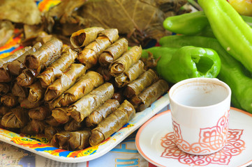 cup of coffee and yaprak sarma turkish cuisine 