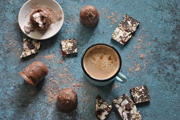 Cup of coffee, chocolate, cocoa powder 