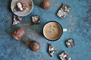 Cup of coffee, chocolate, cocoa powder 