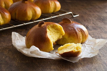 Homemade pumpkin bread buns. Autumn baked.