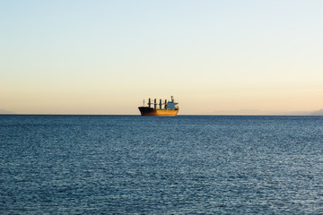 cargo industrial ship in Atlantic ocean water environment scenery landscape, idyllic transportation simple picture with empty copy space for text