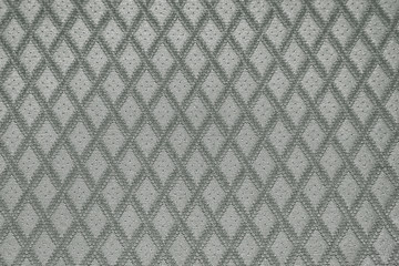 Texture of gray fabric with diamond or rombic pattern