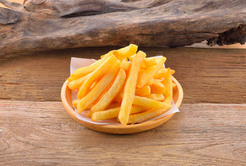 French Fries isolated on wooden background