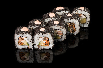 Sushi Roll - Maki Sushi pieces collection with Salmon Roe, Smoked Eel, Cucumber, Cream Cheese, Sesame, Avocado, Onion Fries, Crab Meat, Tobiko isolated on black background - Image