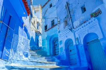 Zelfklevend Fotobehang Street in the blue city of Chefchaouen in Morocco © Delphotostock