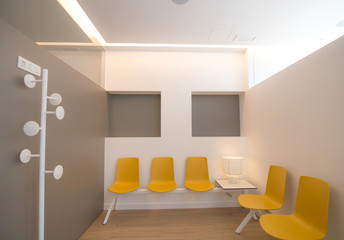Modern and clean waiting room of a private clinic with copy space.