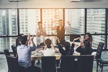 Successful business group celebrating at the meeting room.Business,people,success and winning...