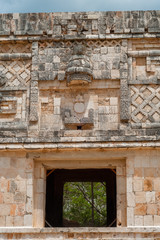 Architectural decors of a Mayan building, in the archaeological area of Ek Balam, on the Yucatan peninsula