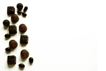 Chocolate candy isolated on white background. Free space.
