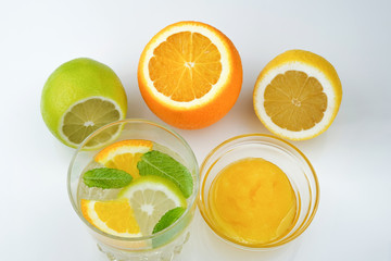 Glass of drink with citrus juice