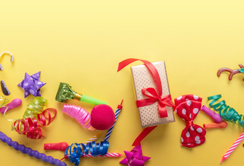 Fototapeta premium Items for carnival on yellow background.