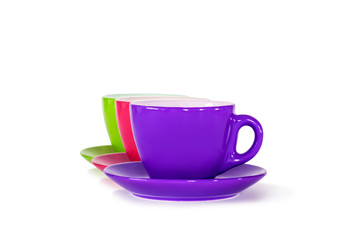 mug with saucer multicolored set colors on white isolate background