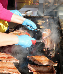 many pieces of meat grilled during a festival