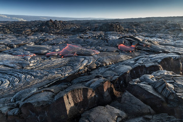 View of lava field against sky