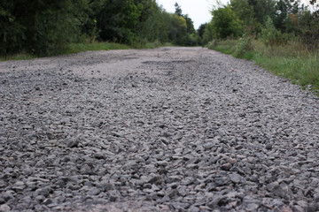 The asphalt road collapsed to rubble.