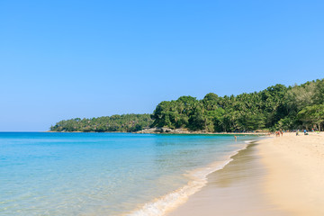 Crystal clear turquoise blue Andaman sea at Surin Beach, Phuket, Thailand