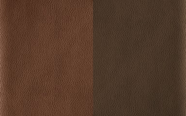 The texture of genuine leather. Impeccable and stylish background. Beautiful stylish background. Natural skin texture close up. Brown background.  The structure of the leather material brown shades.