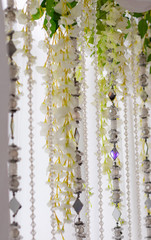 White flowers and glass decorations at a wedding reception