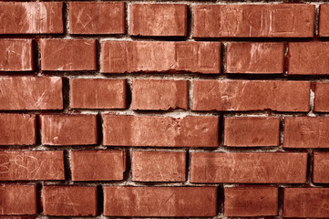 Obraz premium Worn weathered red dirty brick wall background backdrop. Close up