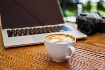 Delicious soft latte coffee on the table