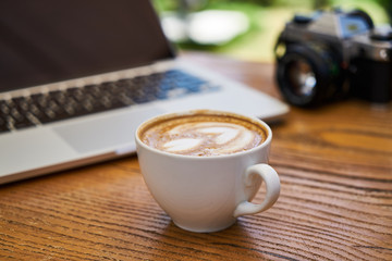 Delicious soft latte coffee on the table
