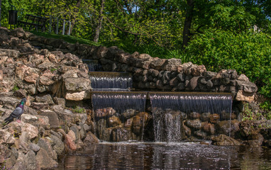 Small Water Cascade In The City Park.