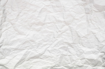 Background of white crumpled paper