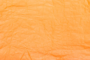 Background of orange crumpled paper