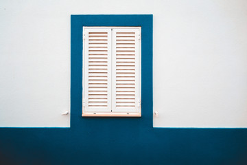 white window with blue frame
