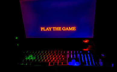Fototapeta premium Iilluminated computer keyboard at nigh