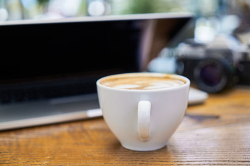 Delicious soft latte coffee on the table