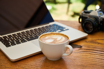Delicious soft latte coffee on the table