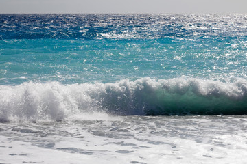 Sea waves by the shore in Nice, France