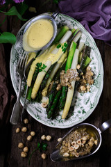 White and green asparagus with two sauces