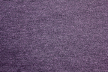 Violet cloth texture background of simple dark seamless purple fabric 