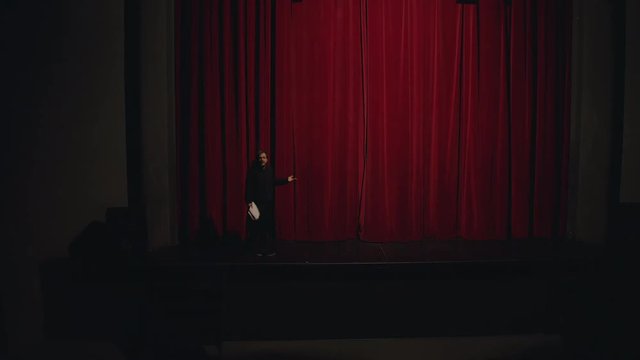 Actor in a theatre reviewing the script