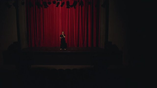Actor in a theatre reviewing the script