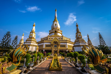 Fototapeta premium Chai Mongkol Chedi Pagoda in Wat Pha Nam Thip Prasit Wanaram, Landmark at Roi Et Province, Thailand.