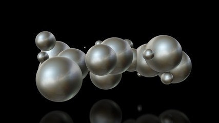 3D illustration of metal balls of different sizes randomly arranged in space and penetrating into each other. A futuristic image, an abstraction. 3D rendering isolated on black background.
