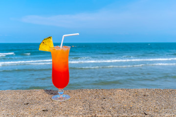 Fruit punch on the beach, refreshing fruit punch mocktail and summer drinks.