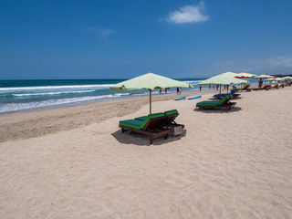 Fototapeta premium Bali, November 2019: Located on the western side of the island's narrow isthmus, Kuta Beach is Bali's most famous beach resort destination. Indonesia