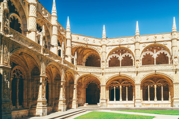 Naklejka premium Jeronimos Hieronymites Monastery Of The Order Of Saint Jerome In Lisbon, Portugal Is Built In Portuguese Late Gothic Manueline Architecture Style